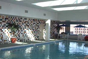 Indoor Pool, Fitness Center, and Game Room photo